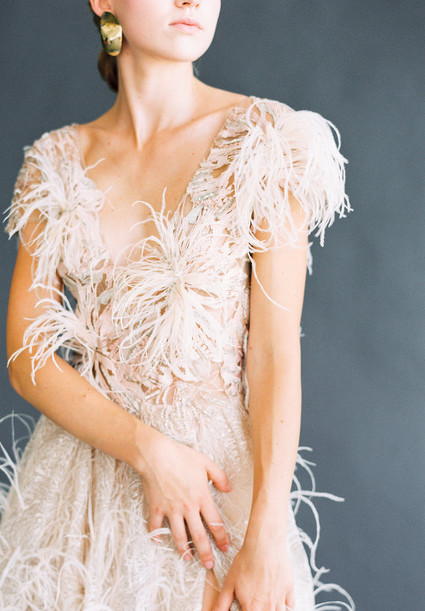 white feather wedding dress