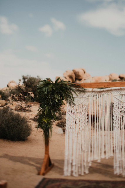 Macrame backdrop for wedding in Joshua Tree