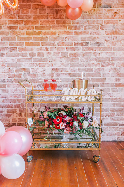 balloon arch and bar cart