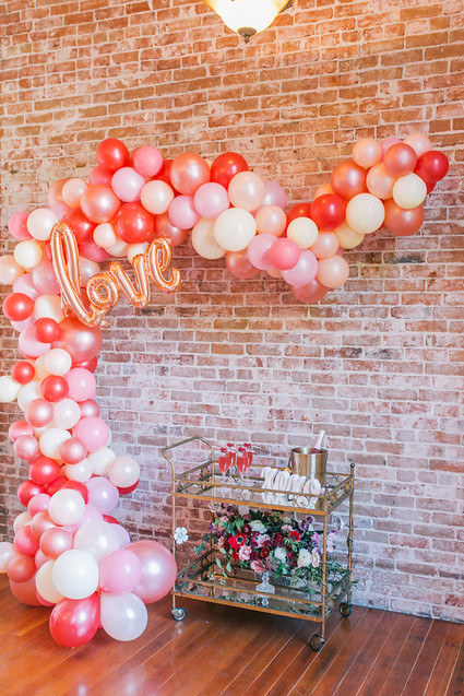 balloon arch and bar cart