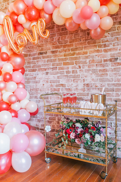 balloon arch and bar cart