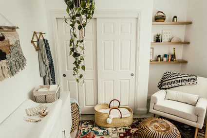 Gender neutral gold and emerald boho nursery