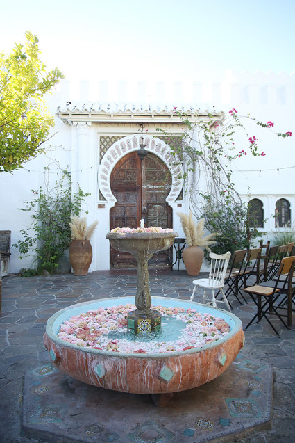 Fountain full of flowers for wedding decor