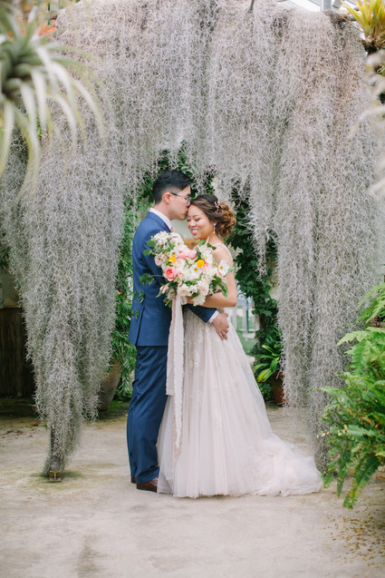 Whimsical greenhouse wedding at Shelldance Orchid Gardens