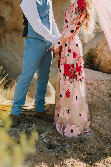 Rustic Joshua Tree wedding with a pink floral dress