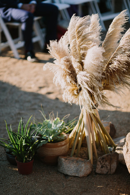 Rustic Joshua Tree wedding with a pink floral dress