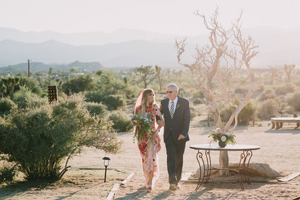 Rustic Joshua Tree wedding with a pink floral dress