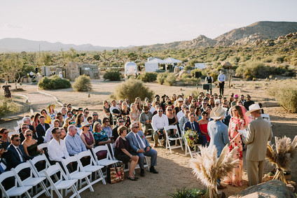 Rustic Joshua Tree wedding with a pink floral dress