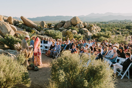 Rustic Joshua Tree wedding with a pink floral dress