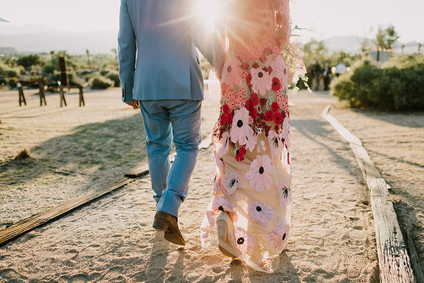 Rustic Joshua Tree wedding with a pink floral dress