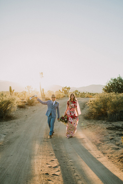 Rustic Joshua Tree wedding with a pink floral dress