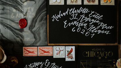 black wedding envelopes with calligraphy