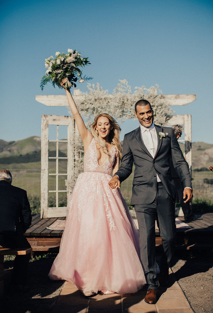 Rustic California wedding with a pink dress