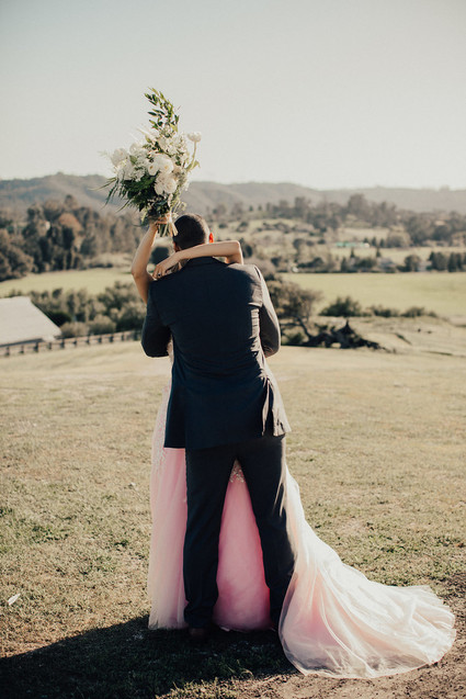 Rustic California wedding with a pink dress