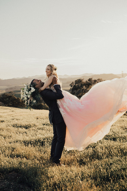 Rustic California wedding with a pink dress