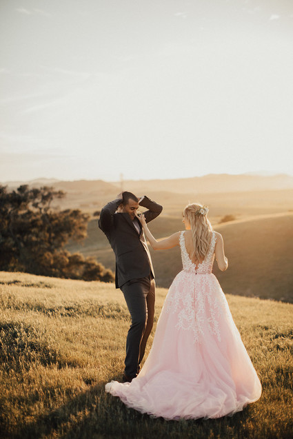 Rustic California wedding with a pink dress