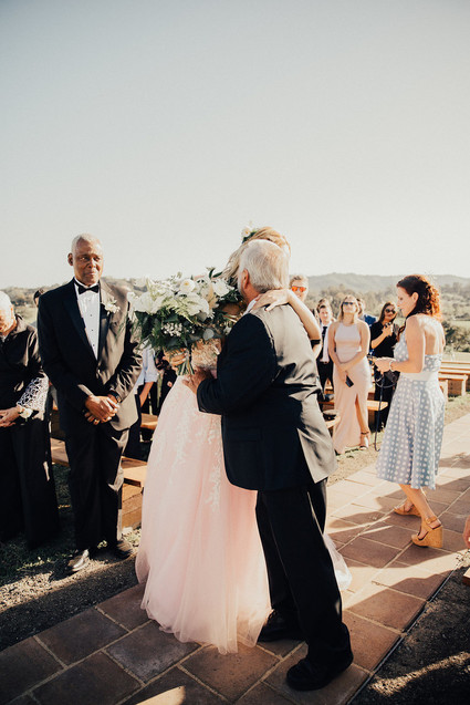 Rustic California wedding with a pink dress