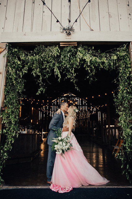 Rustic California wedding with a pink dress