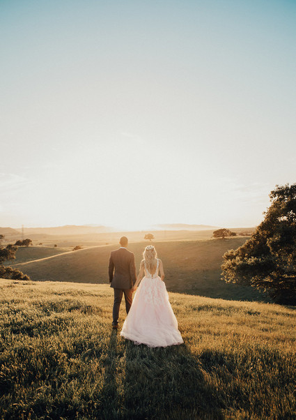 Rustic California wedding with a pink dress