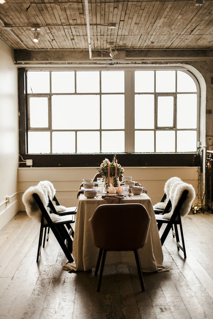 Romantic urban same sex wedding ideas with blush tones