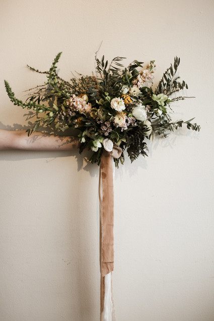 Romantic urban same sex wedding ideas with blush tones