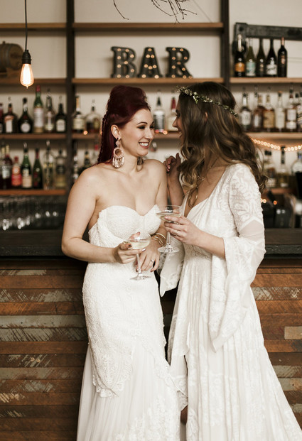 Romantic urban same sex wedding ideas with blush tones