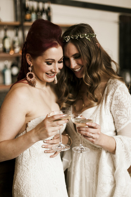 Romantic urban same sex wedding ideas with blush tones