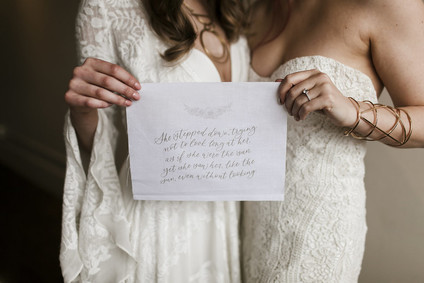 Romantic urban same sex wedding ideas with blush tones