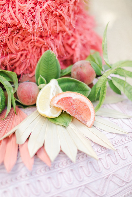 Colorful modern wedding with a killer tropical floral installation