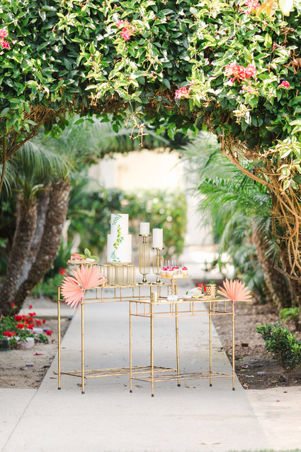 Colorful modern wedding with a killer tropical floral installation