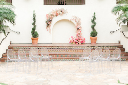 Colorful modern wedding with a killer tropical floral installation
