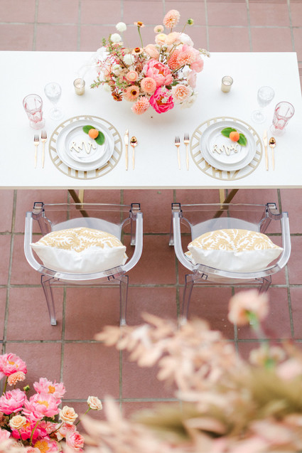 Colorful modern wedding with a killer tropical floral installation