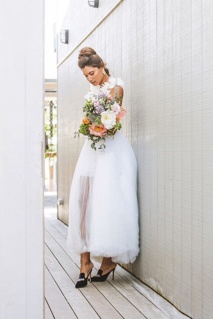 Surf inspired beach wedding in Montauk with the world's cutest dress