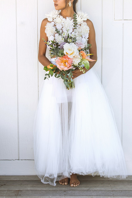 Surf inspired beach wedding in Montauk with the world's cutest dress