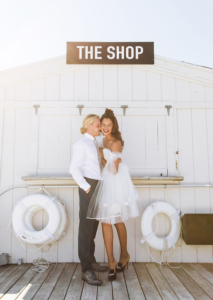 Surf inspired beach wedding in Montauk with the world's cutest dress