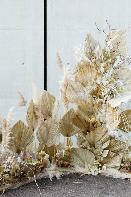 Modern french tropical wedding installation with dried flowers
