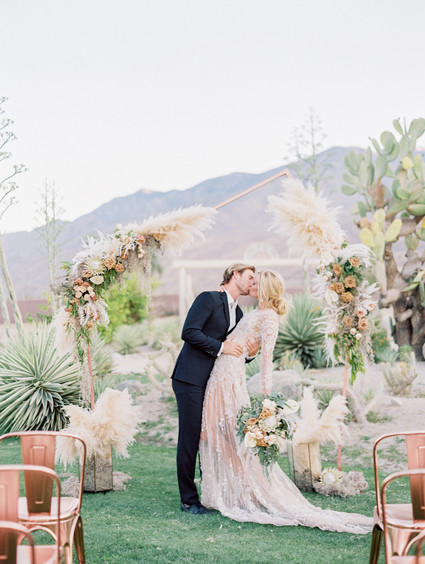 An all pink Palm Springs wedding (and venue!) with copper and pampas grass