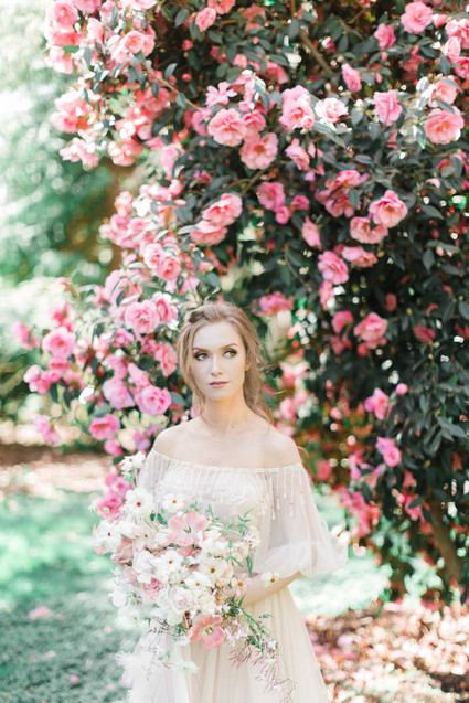 A stunning bridal editorial with a giant pink camellia tree