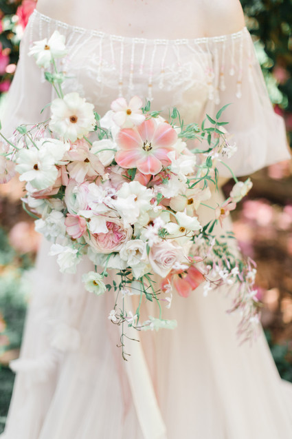 A stunning bridal editorial with a giant pink camellia tree