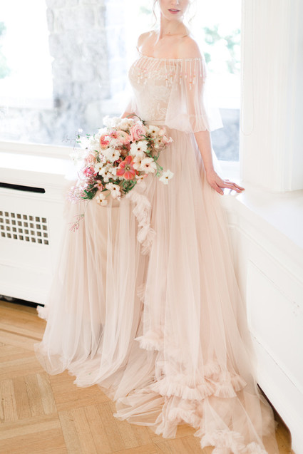 A stunning bridal editorial with a giant pink camellia tree