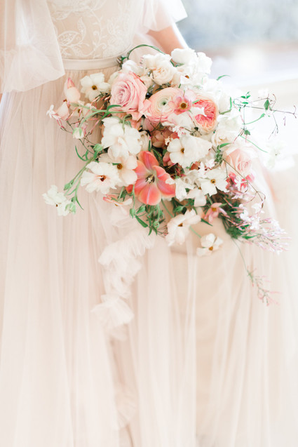 A stunning bridal editorial with a giant pink camellia tree