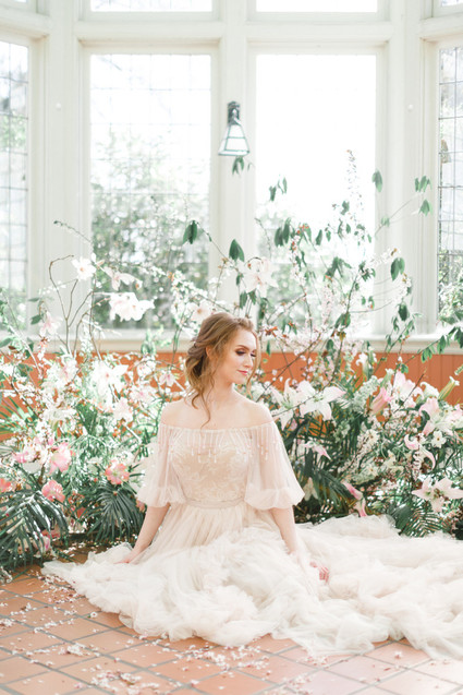 A stunning bridal editorial with a giant pink camellia tree