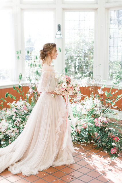 A stunning bridal editorial with a giant pink camellia tree