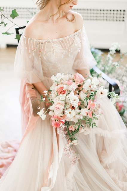 A stunning bridal editorial with a giant pink camellia tree