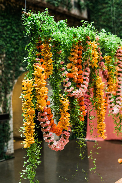 Ultra colorful wedding design inspired by Indian floral garlands and Day of the Dead
