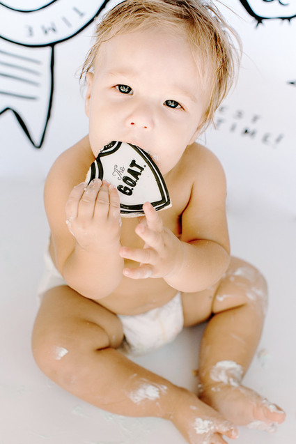 Greatest of All Time (G.O.A.T.) first birthday cake smash session Inspiration