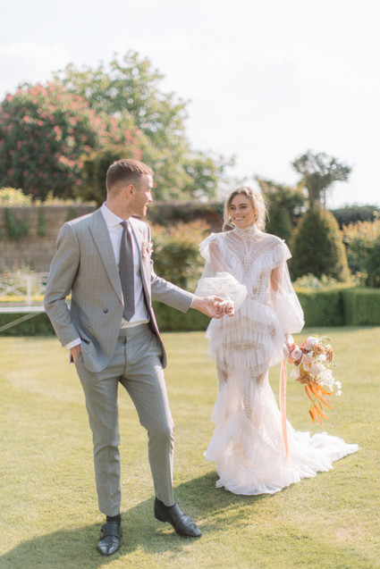 Modern stylish fairytale wedding in a dramatic English garden