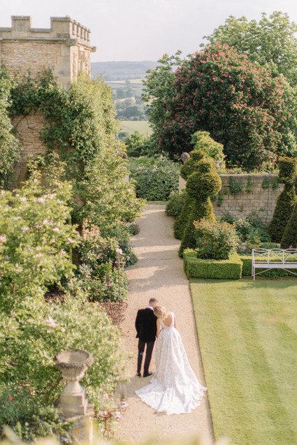 Modern stylish fairytale wedding in a dramatic English garden