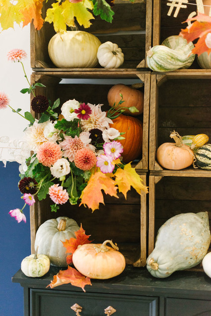 fall wedding decor with pumpkins