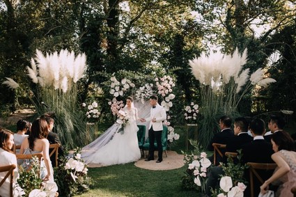 A moody dream garden wedding for a fashion forward couple at Palacio Villahermosa in Spain